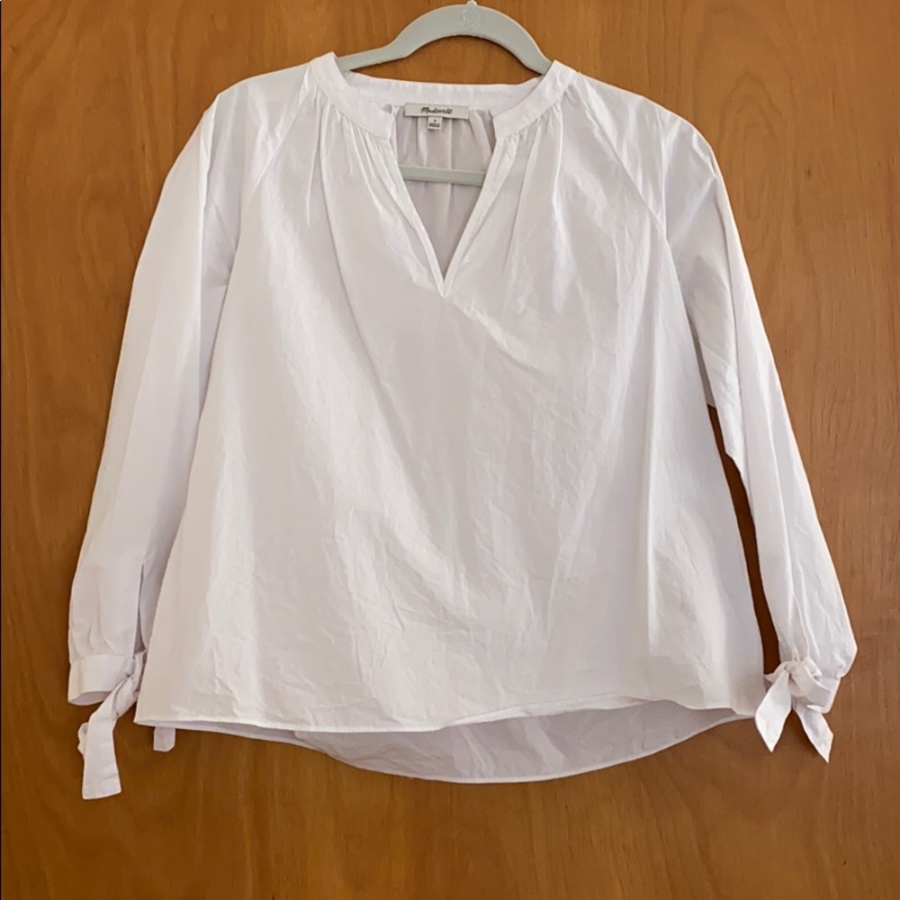 White blouse with v neck and tie sleeves